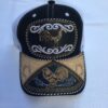 Gorra negra con blanco con gallo dorado